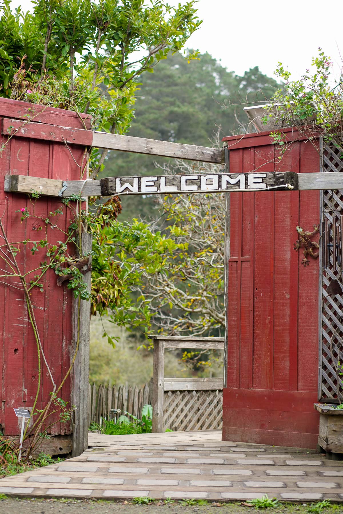 Gate with Welcome posted above it