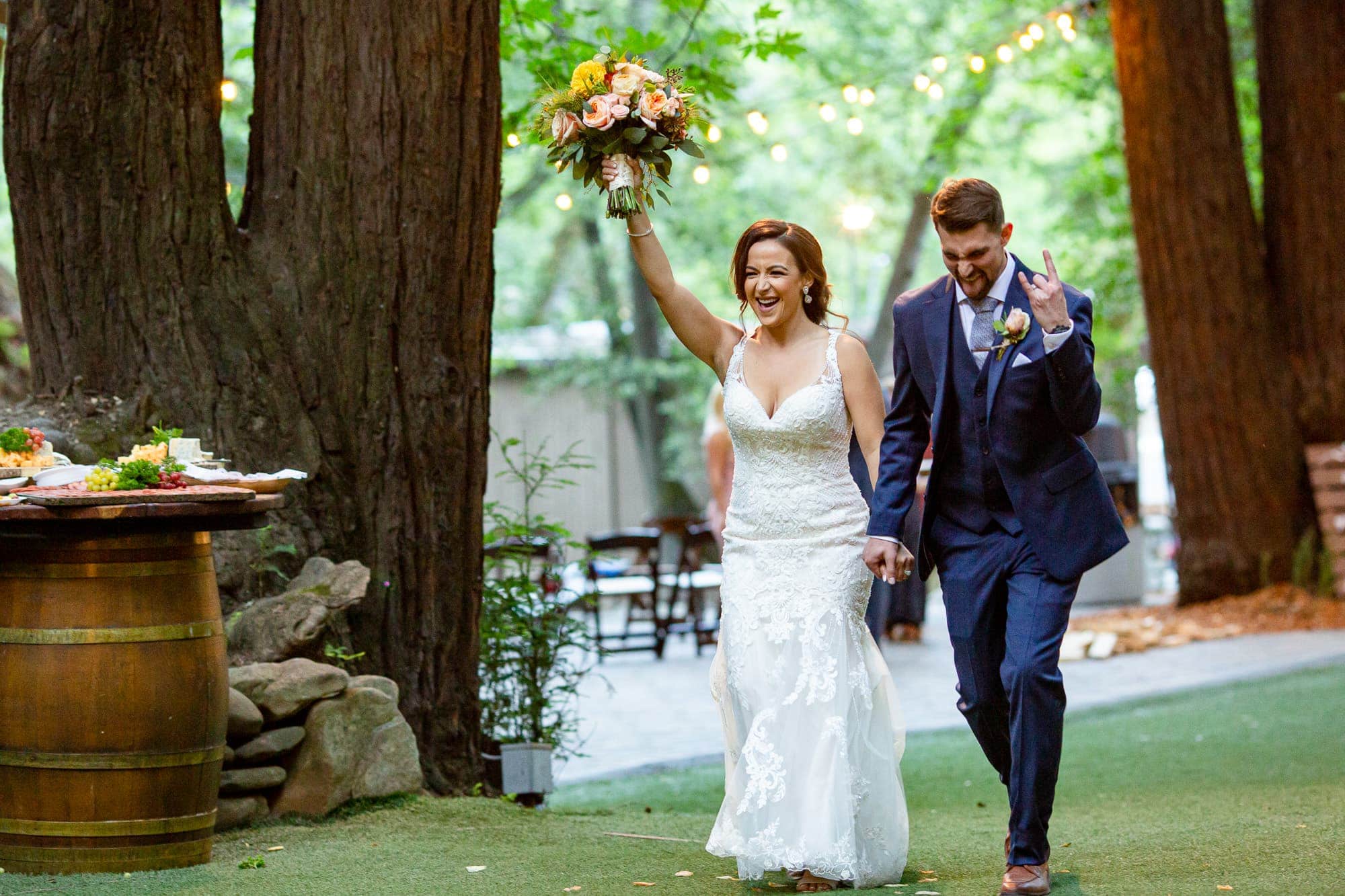 Bride and Groom making an entrance to outdoor reception in Saratoga Springs