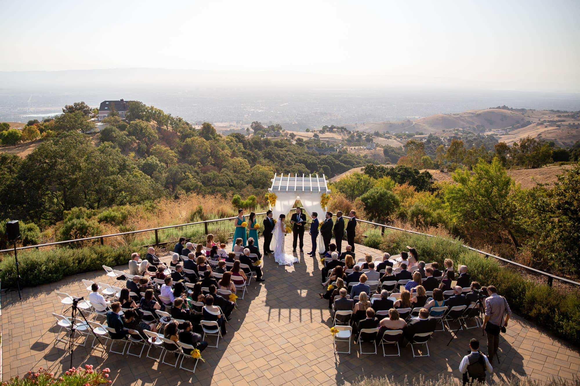 San Jose hills wedding ceremony with view of the city in the background