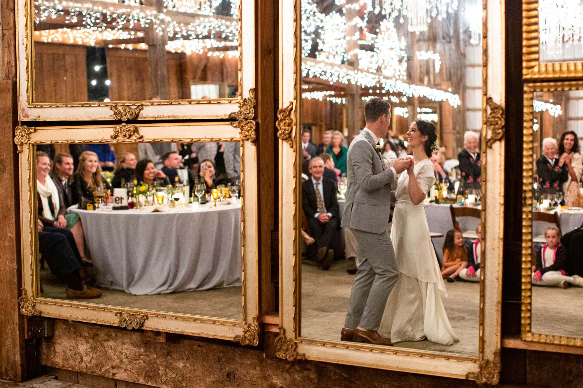 First dance reflection in barn in tomales bay