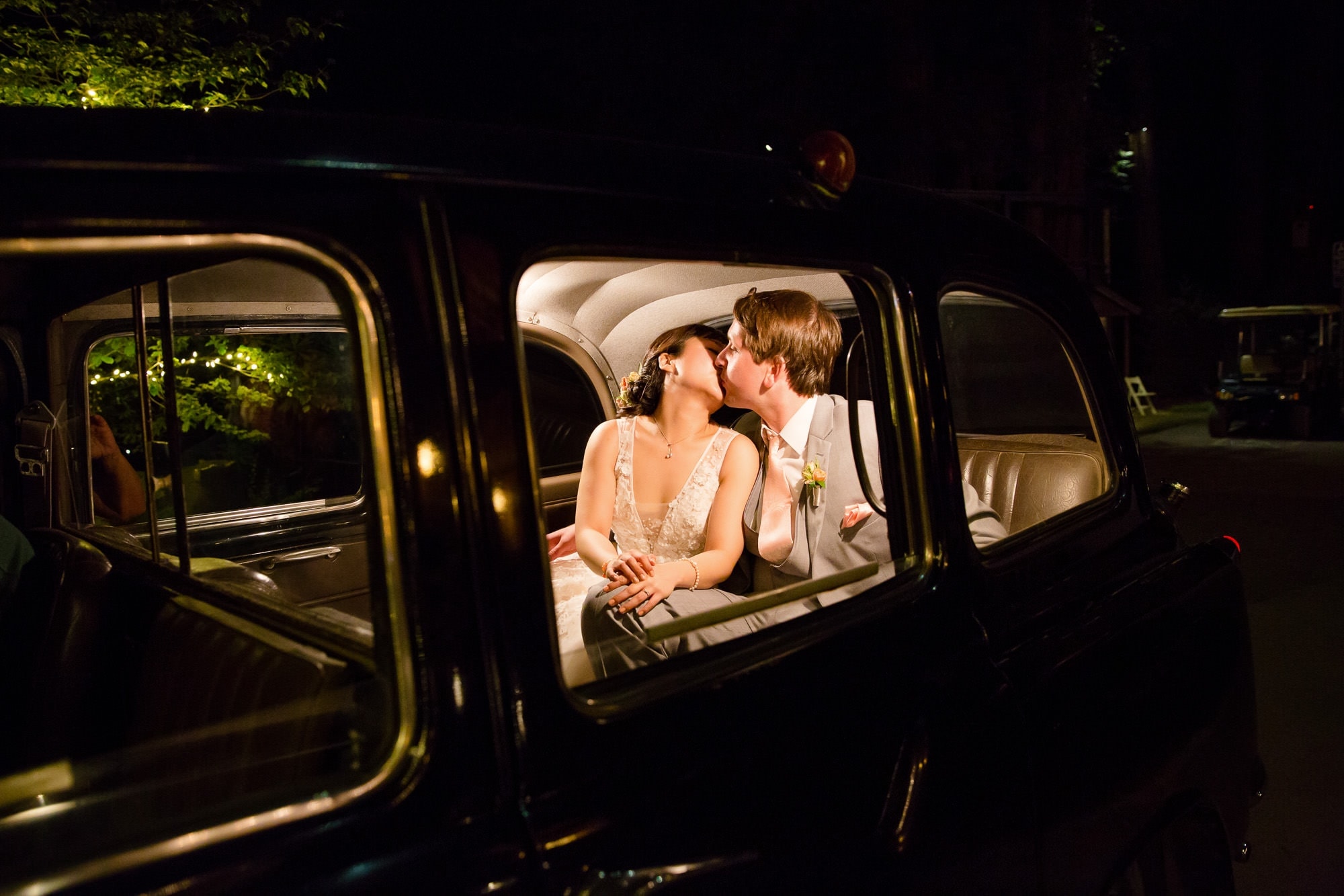 Nestldown wedding with bride and groom send off in antique car